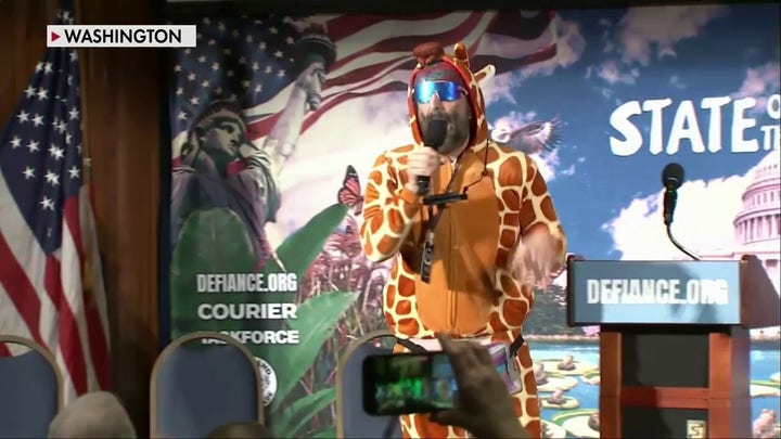 Anti-Trump activists hold press conference dressed in costumes sparking backlash from conservatives.