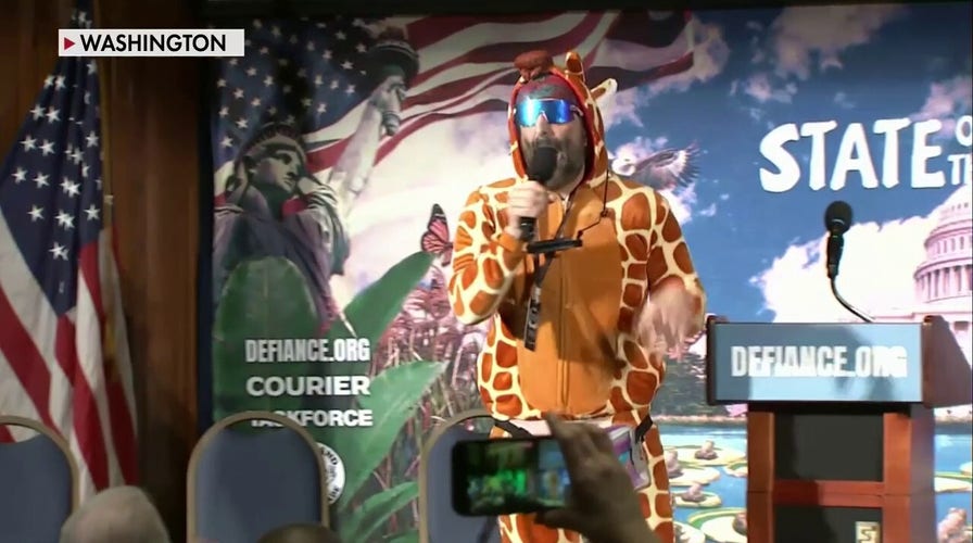 Anti-Trump activists hold press conference dressed in costumes sparking backlash from conservatives.