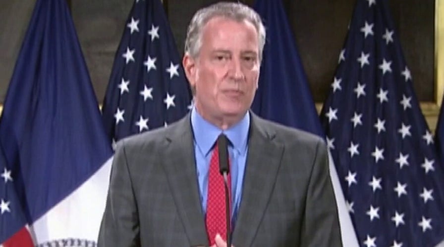 Mayor Bill de Blasio under fire over handling of protests in New York City