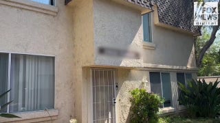 Exterior shots of murder suspect Raymond Boodarian's Los Angeles apartment