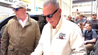 Bruce Springsteen ignores question about Trump feud while signing autographs