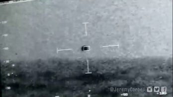 UFO appears to disappear in the water without making a splash