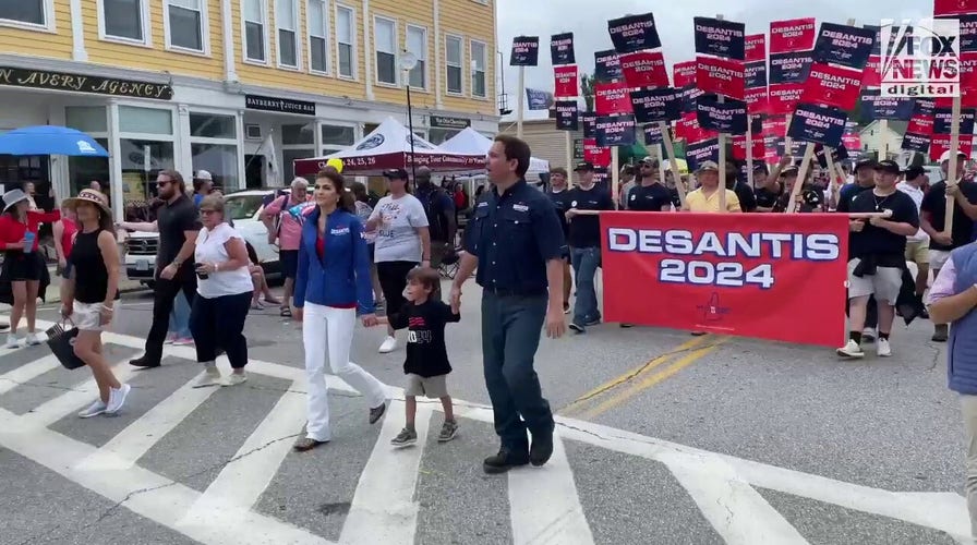 Gov. Ron DeSantis marching during the Independence Day parade in New Hampshire