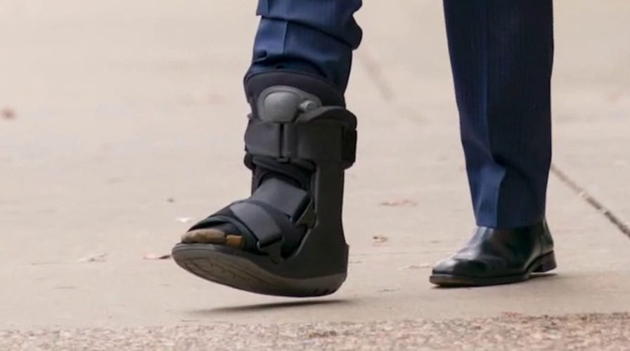 Joe Biden says foot injury happened while chasing dog's tail