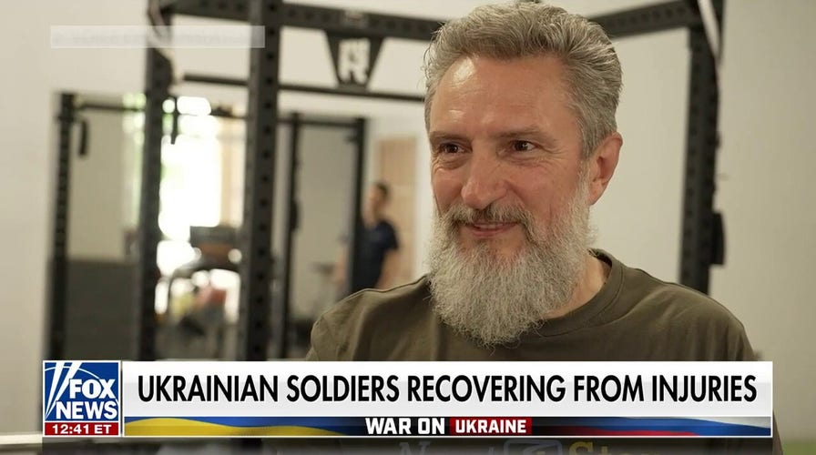 Injured Ukrainian soldiers make efforts at recovery in order to return to fight
