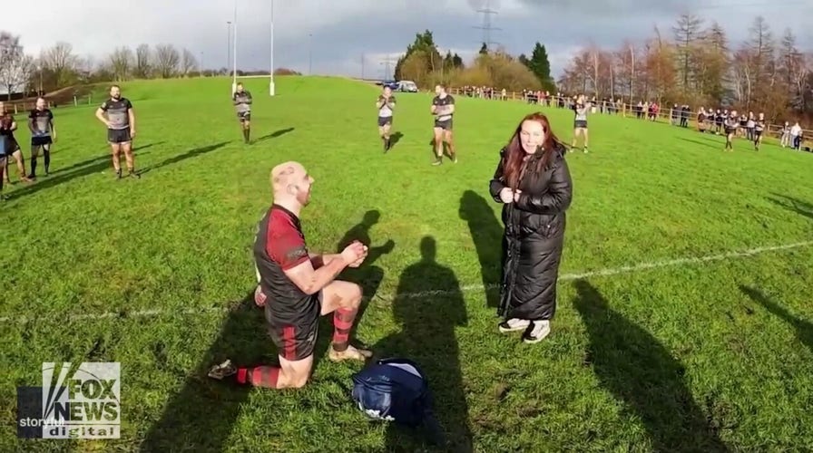 Game on! Rugby player fakes injury, then proposes: See the sweet video