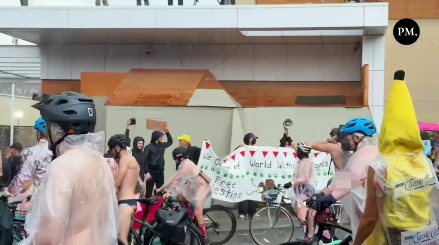 Bare-bottomed bikers roll through rain to shout at feds in blue city's latest anti-ICE stunt