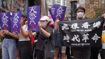 Protesters swarm Hong Kong shopping district in response to proposed security law