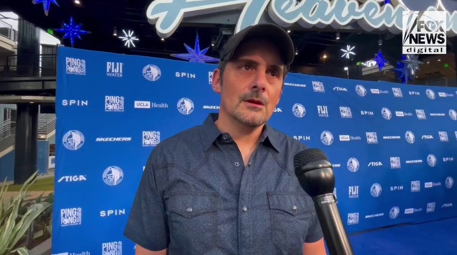 Brad Paisley talks his ping pong game and recalls Olivia Newton-John's kindness