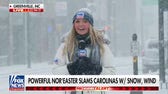 Bomb cyclone Nor’easter intensifies across Carolinas, bringing historic snow and massive travel delays