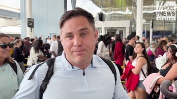 Travelers waiting in massive Houston airport line reveal who they blame for fiasco