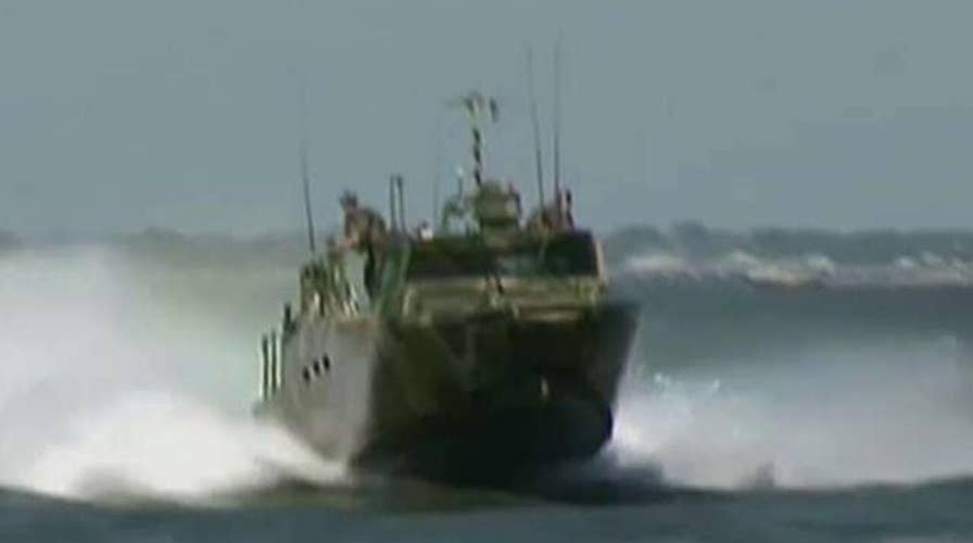 Iran releases ten captured US sailors, demands apology