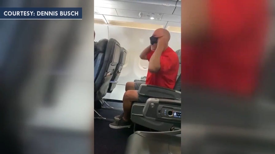 Unruly American Airlines passenger growls at flight crew, shouts 'Joe Biden, really?'