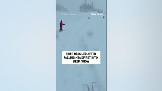 Skier RESCUED after falling HEAD FIRST into deep snow