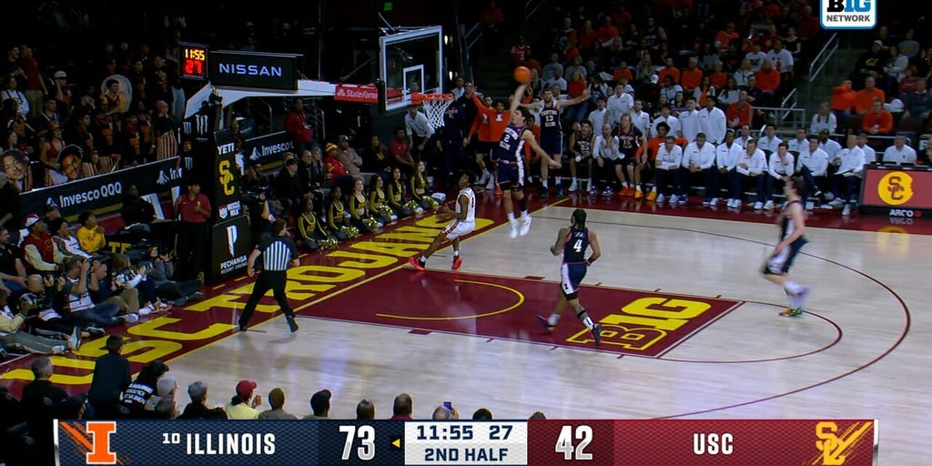Andrej Stojakovic finishes in transition with a fast break SLAM, extending the Illinois lead over USC