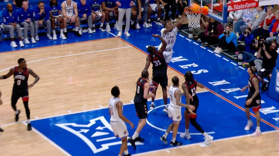Flory Bidunga finishes beardown  dunk disconnected  retired  of bounds play, extending Kansas's pb  implicit    Utah