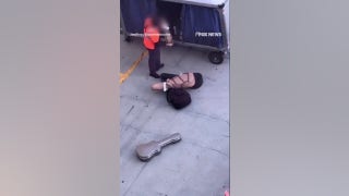 Baggage handler CAUGHT tossing guitars onto tarmac