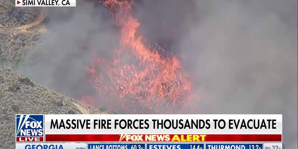 Fast-moving California brush fire scorches hundreds of acres