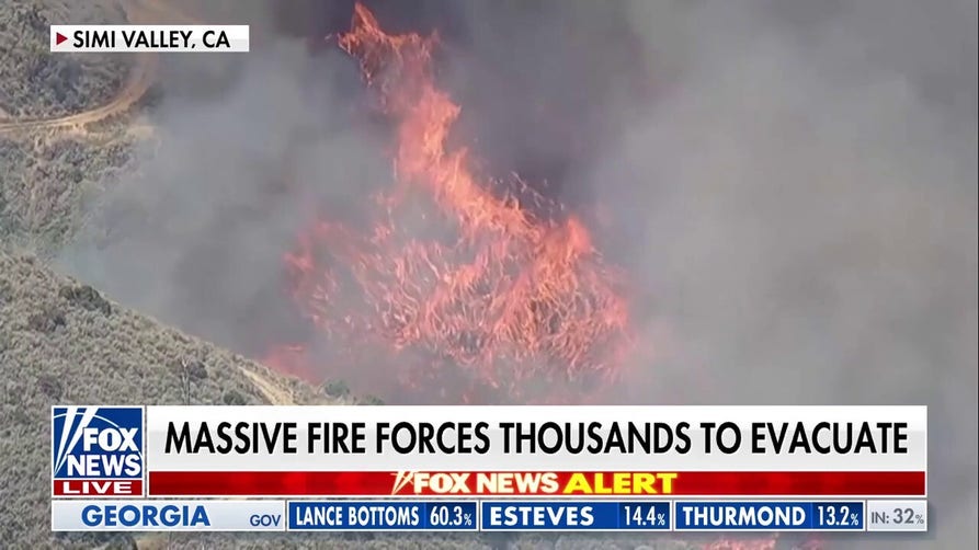 Fast-moving California brush fire scorches hundreds of acres