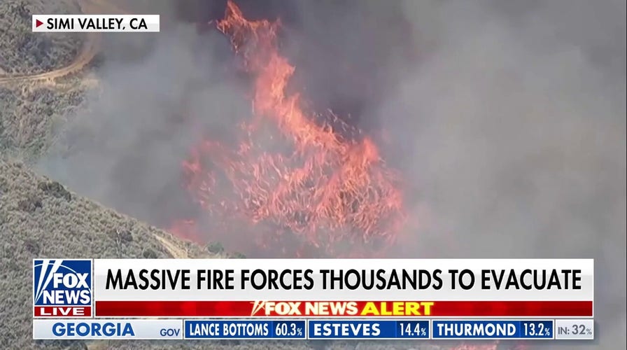Fast-moving California brush fire scorches hundreds of acres