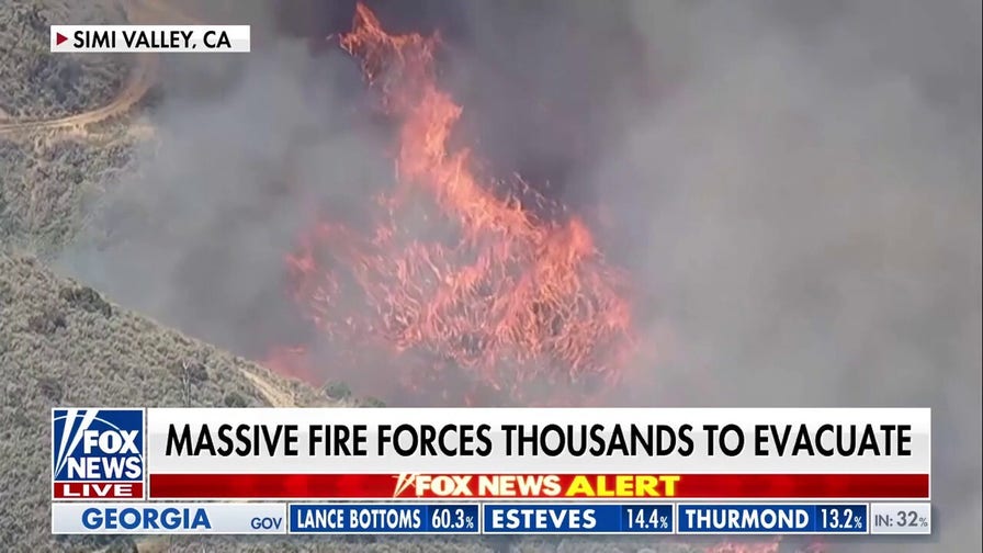 Fast-moving California brush fire scorches hundreds of acres