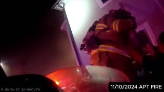 Texas firefighter pulls 2-year-old from burning apartment building in dramatic rescue - Fox News