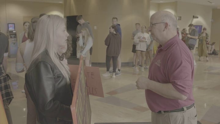Dozens protest Liz Wheeler's appearance at James Madison University
