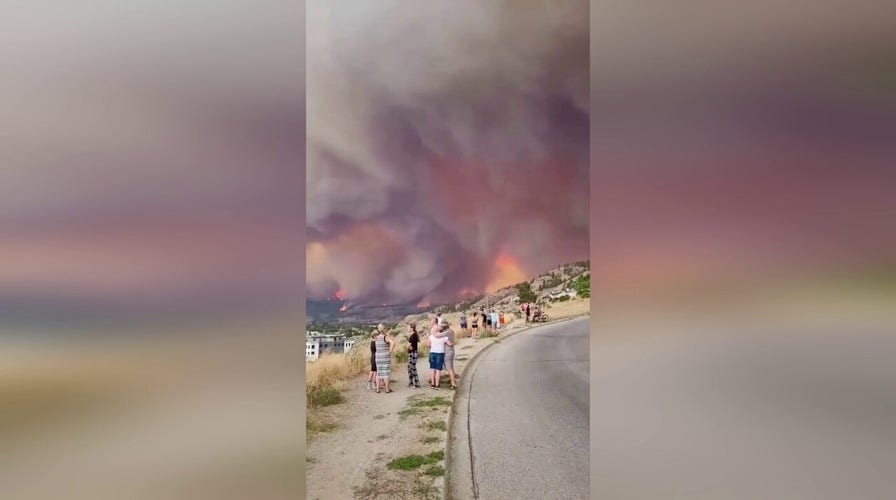 Residents in British Columbia observe growing wildfires