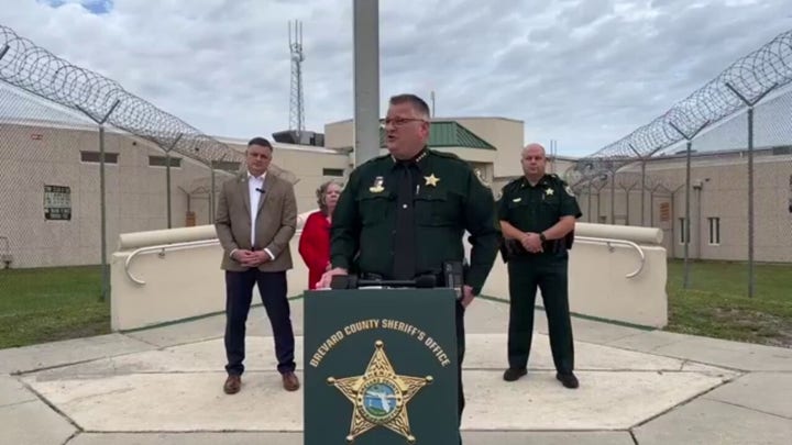  Florida sheriff calls for new student disciplinary measures in front of a jail.