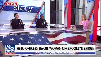 Hero police officers detail rescue of woman off Brooklyn Bridge