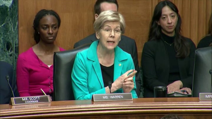 Warren grills Fed nominee Warsh on fortune, probing links to Trump, China and Epstein