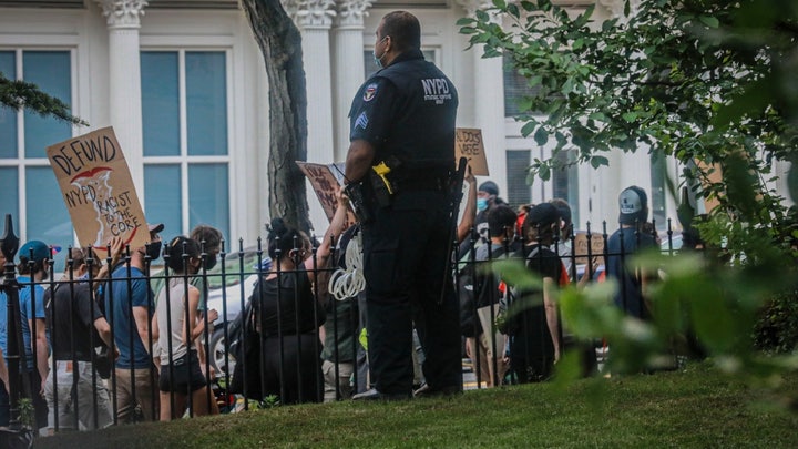 Protesters camp outside NYC city hall, demand $1 billion cut to police budget