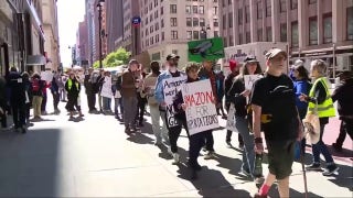 May Day activists gather outside Amazon NYC location