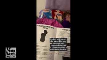 Nanny reads little girl the coffee machine manual before the child's nap