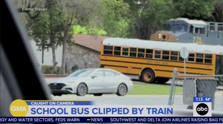 School autobus  successful  Florida clipped by bid     arsenic  it conscionable  makes it crossed  the tracks