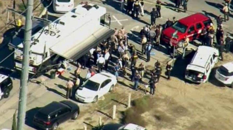 Witness: Black SUV pulled slowly away from shooting site