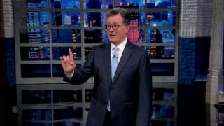 Colbert's audience boos as he declares Trump is 'very much alive'