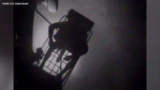 Dramatic footage shows the US Coast Guard rescuing a family of three off the coast of the Bahamas