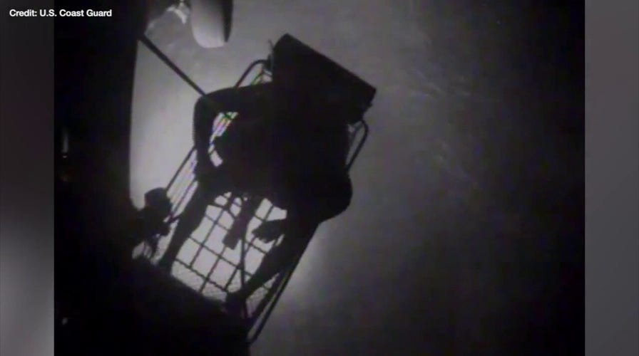 Dramatic footage shows the US Coast Guard rescuing a family of three off the coast of the Bahamas
