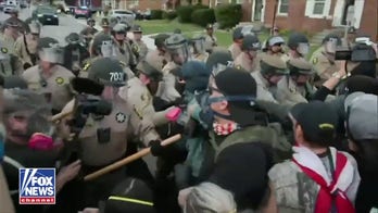 Law enforcement clash with protesters near ICE facility