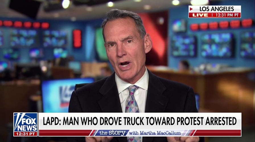 Man arrested, held without bail after allegedly driving truck into crowd of Iranian protesters