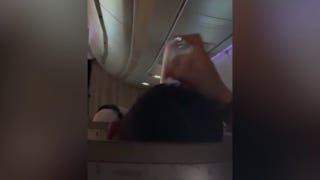 Fellow passengers horrified by what man uses to scratch his scalp mid-flight