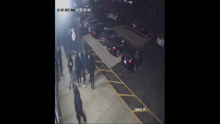 Chicago surveillance video shows 10 thieves breaking in to luxury dealership, stealing sports cars