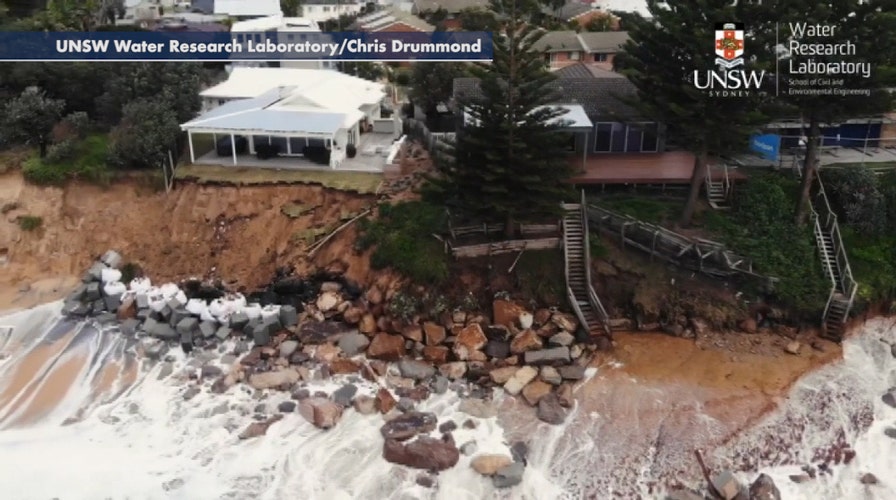 Drone footage shows homes close to collapse due to coastal erosion in Australia