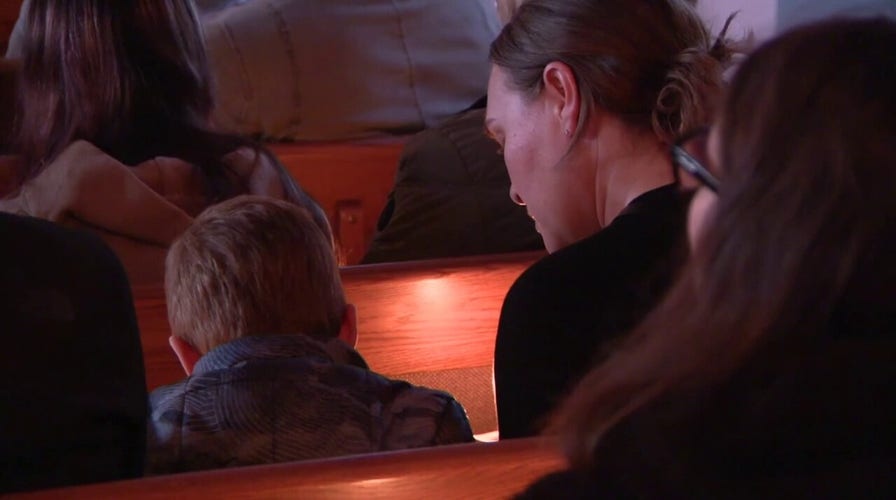 Members of community react to Washington lakefront family massacre