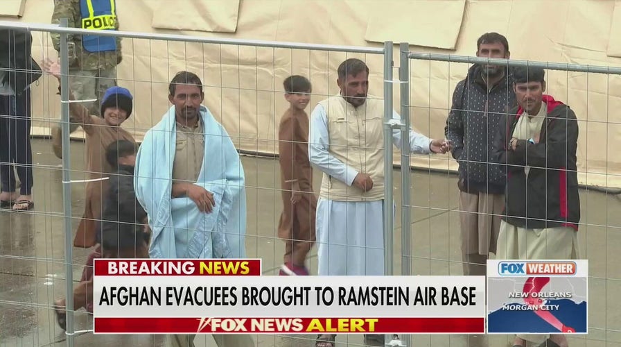 Afghan refugees flown to Germany fear for those left behind