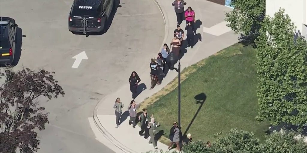 Hospital staff, visitors exit with hands raised after shooting in Delaware