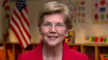 Warren's kid-block background spells out almost-hidden message in convention speech