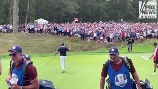 Bryson DeChambeau reacts to winning a hole