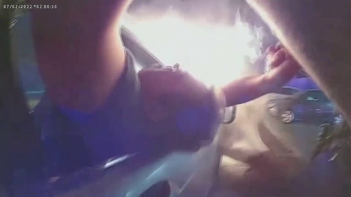New Jersey police officers save driver from burning vehicle